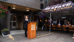 Director of Communications Ellen Maloney speaking at 49th State Brewing @ The Rail